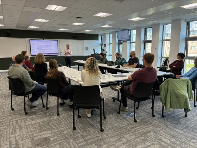 MoSS researchers taking part in a round-table workshop